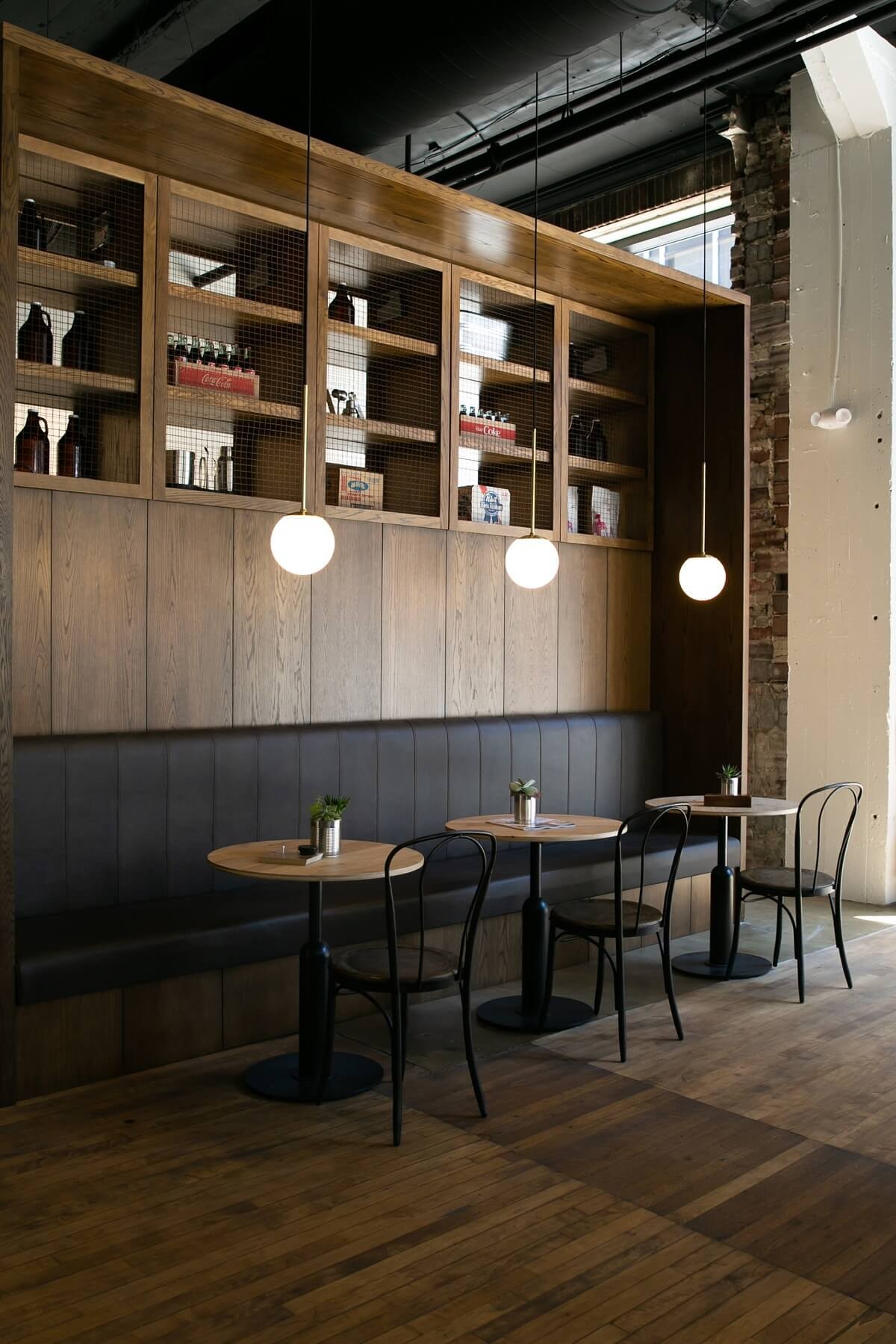 Dining banquette — wood wall paneling and built-in cabinetry