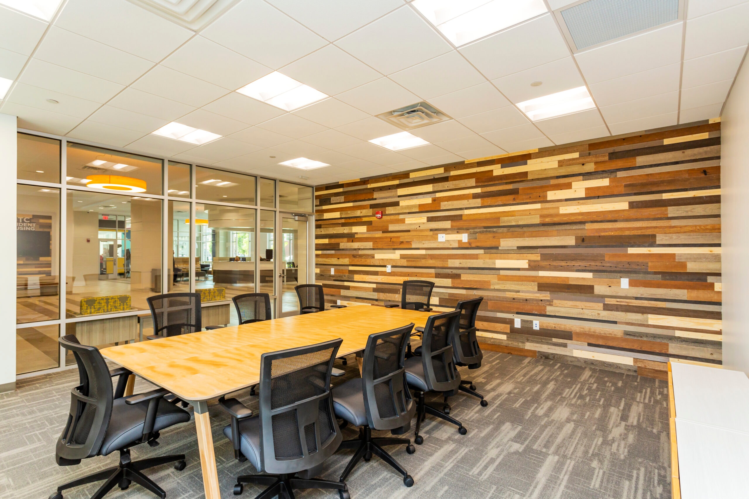 Conference room with reclaimed wood accent wall